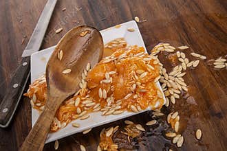Cantaloupe seeds removed from a fresh ripe cantaloupe