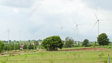 Wind turbines on the wind farm field. Electricity production industry, sustainable clean energy, environment conservation