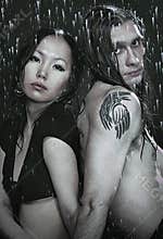 Young couple in aqua studio