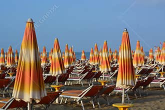 Beach umbrellas still closed early in the morning