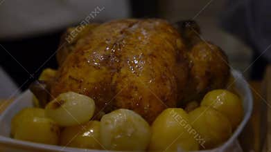 Slow motion Thanksgiving Preparing tipical delicious Turkey Cooking In Oven