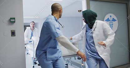 Doctors running with patient in hospital bed in emergency 4k