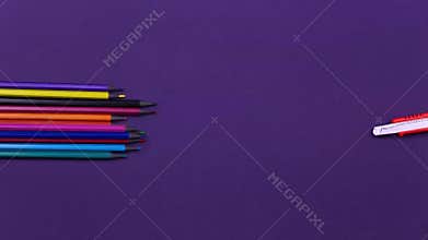 Stop motion school stationery animated. Back to school concept. Calculator, pencils, paper clips, stapler and orange