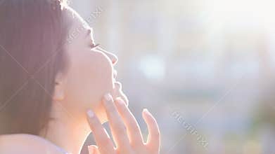 New day beginning woman enjoy morning sun face