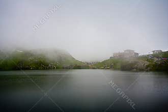 Balea Lake in Romania under a blanket of clouds