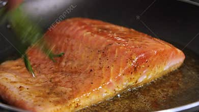 Cooking salmon fish with rice and cucumber