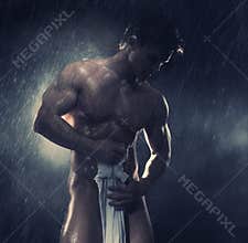 Bodybuilder with white towel