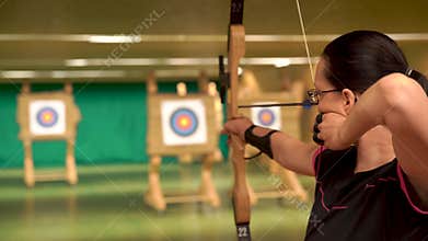 Archery as a sport discipline run in the hall and in the nature. Competition for the best shot an arrow into targets
