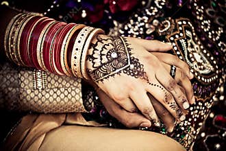 East Indian Wedding Couple Holding Hands