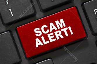 Scam Alert word on keyboard