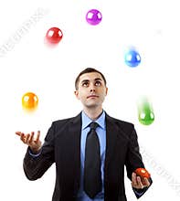Businessman juggling