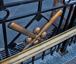 Bats and Balls in the Railing Outside the Baseball Hall of Fame