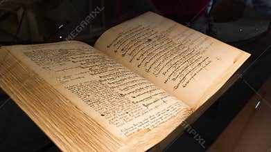 ancient book with old handwritten humanist text