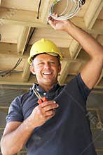 Electrician Working On Wiring