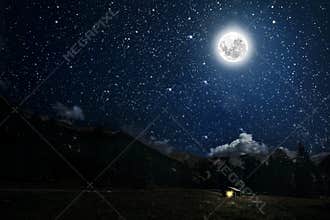 The moon shines over the manger of christmas of Jesus Christ