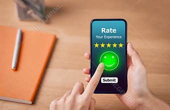 Evaluation and rating concept, woman pressing happy smile face emoticon and 5 star rating or review on smartphone.