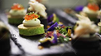 View of delicious and nice ooking canapes decorated on table for catering