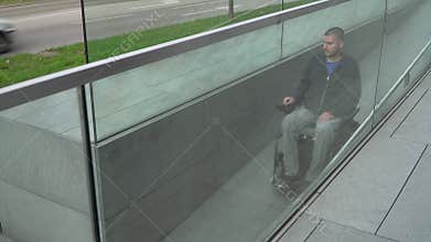 4k resolution follow of a man on electric wheelchair using a ramp. Accessibility concept