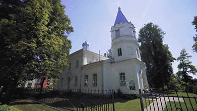 White orthodox church in a small summer town in Latvia
