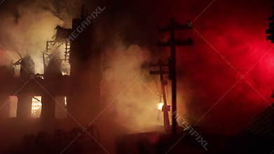 Flames on the ground and blasts with smoke in the distance. Apocalyptic view of city downtown as disaster film poster concept. Nig