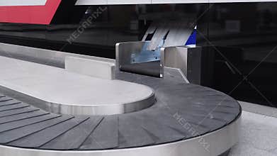 Empty conveyor belt in the baggage claim area of international airport