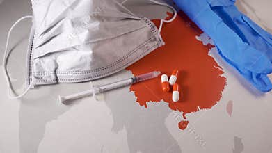 Surgical mask over a China map. Disease outbreak by coronavirus concept