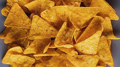 Tortilla chips filling a rectangular plate - close up