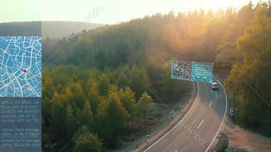 Self Driving car driving on a forest highway with technology assistant tracking information, showing details.