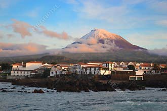 The highest mountain of Portugal, the Azores volcano Montanha do Pico on the island of Pico at sunset