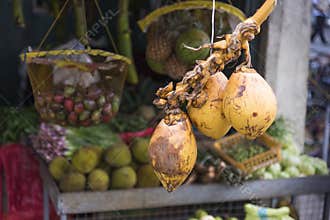 Nuwara Eliya, Sri Lanka:  Traditional fruit and veg shop with King Coconut display