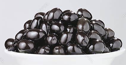 Shining olives on the dish