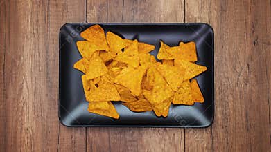 Tortilla chips filling a rectangular plate - stop motion animation