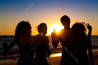 People having party at beach with drinks