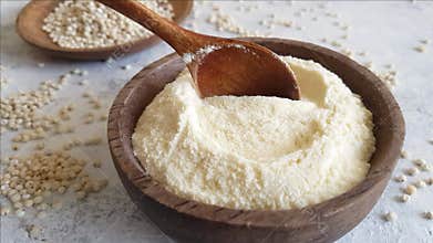 Raw White Sorghum grain flour and grain in a bowl