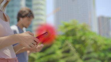 Concept of a contact tracing app for coping with COVID-19 Pandemic. A woman gets a notification that potentially