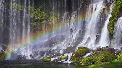 Shiraito waterfall with rainbow in Autumn, Japan