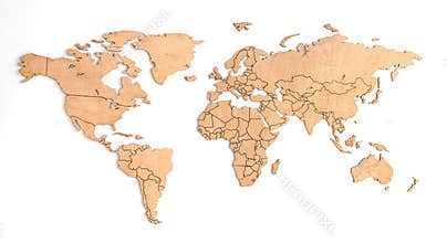 Wooden world map on a white wall