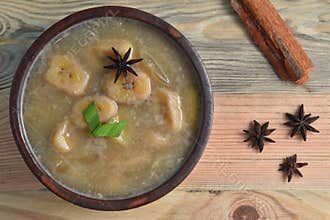 Kolak pisang, Indonesian dessert, made from banana and kolang-kaling cooked with palm sugar, coconut milk, pandanus leaves