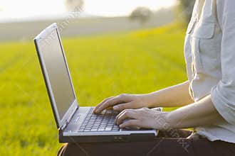 Working outside with laptop
