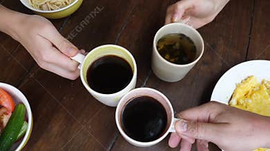 Morning Coffee And Tea Drinking Within Family