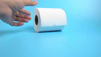 Hand take away last toilet paper roll