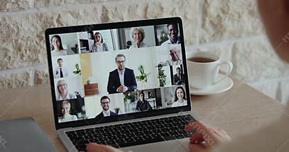 Distance worker video conferencing colleagues team participating virtual meeting
