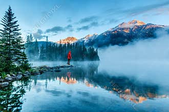 Solitary Man Enjoying Staycation Sunrise Over Pyramid Mountain in Jasper, Alberta, Canada
