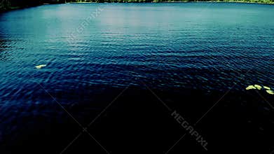 View From Drone On Calm Dark Blue Lake.