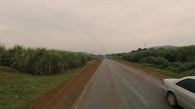 A view of the drive along the countryside, outside Kampala, Uganda, Africa
