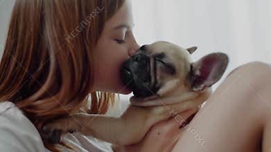 Caring Girl Kisses Her Dear Pet.