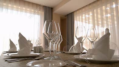 Beautifully served dining table in modern apartment.