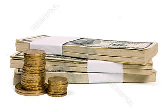 Stack of $100 bills with coins