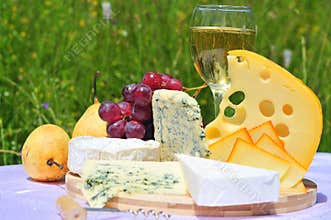French and swiss cheese with fruits and wine