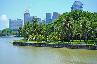 A park by the river in the city